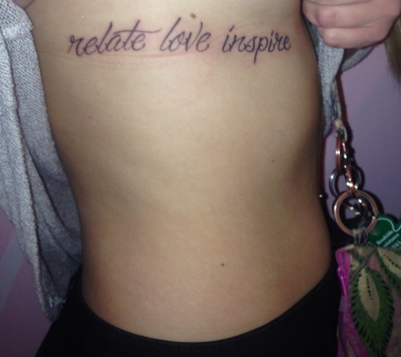 Emily's right side torso tattoo of Mike Posner's inspirational quote "Relate. Love. Inspire." December 2014
twitter.com/emily_brou
