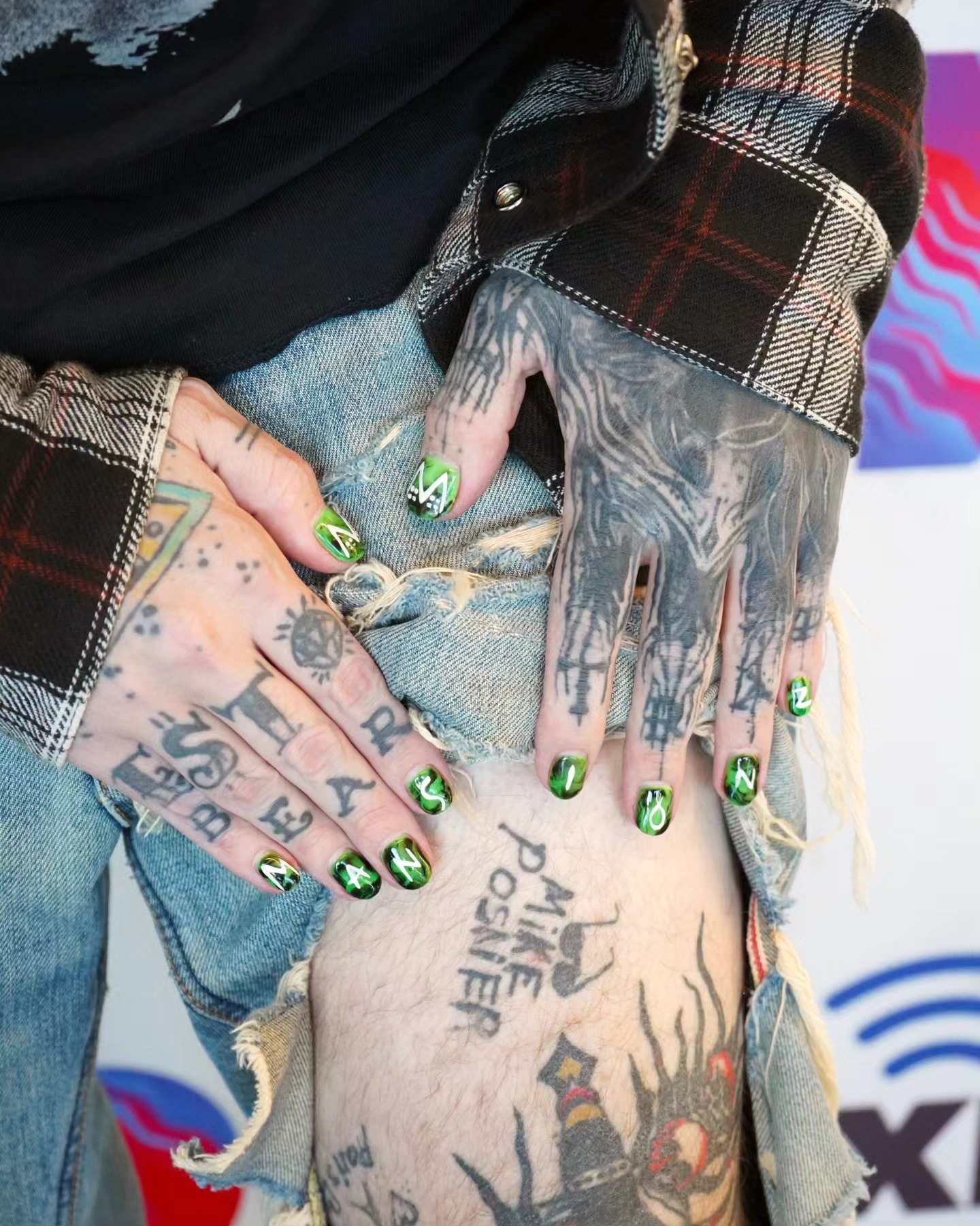 blackbear showing off his Mike Posner tattoo at SiriusXM Hits 1
