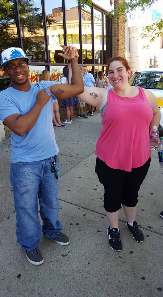 Fans' Matching Inner Bicep Tattoos Featuring Mike Posner's "Relate. Love. Inspire." Quote and Infinity Logo (2016) (1 of 2)
Fans' Matching Inner Bicep Tattoos Featuring Mike Posner's "Relate. Love. Inspire." Quote and Infinity Logo (2016) (1 of 2)