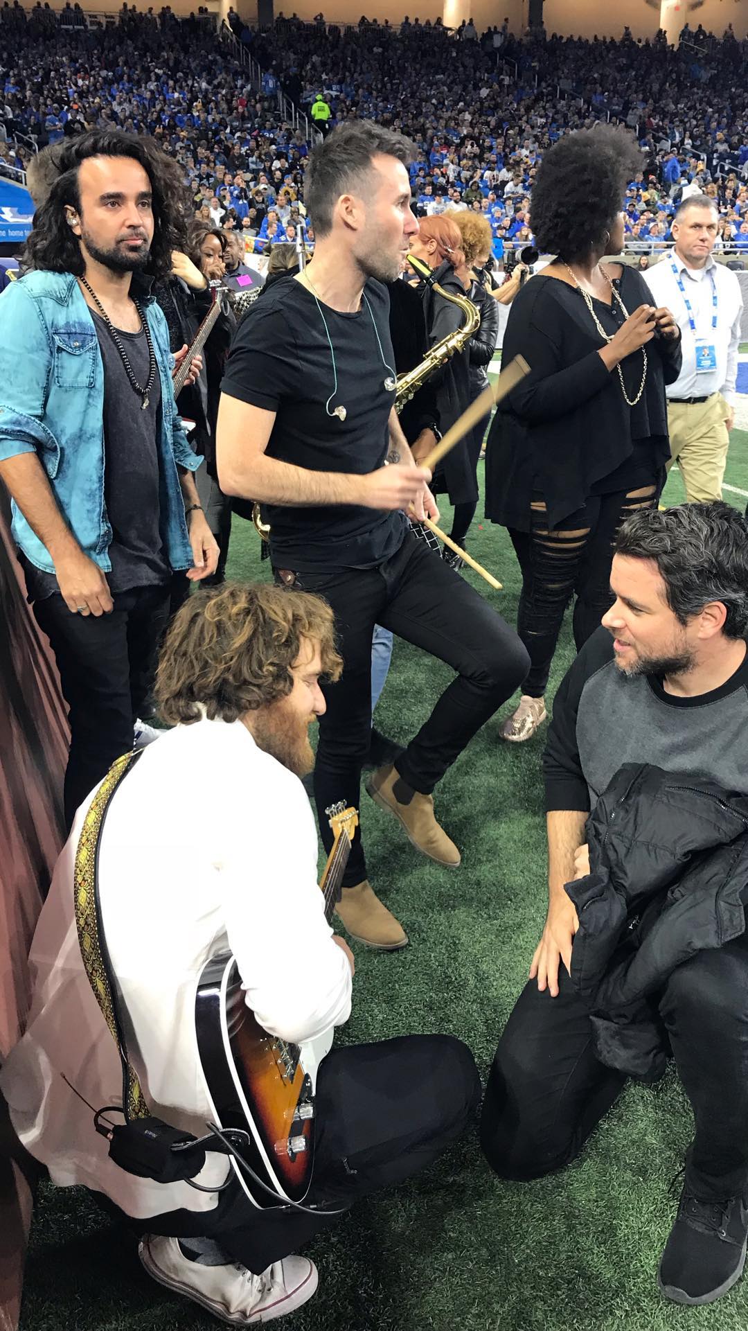 Mike Posner and band members at Ford Field before performing the halftime show
Photo credit: Ryan Chisholm

