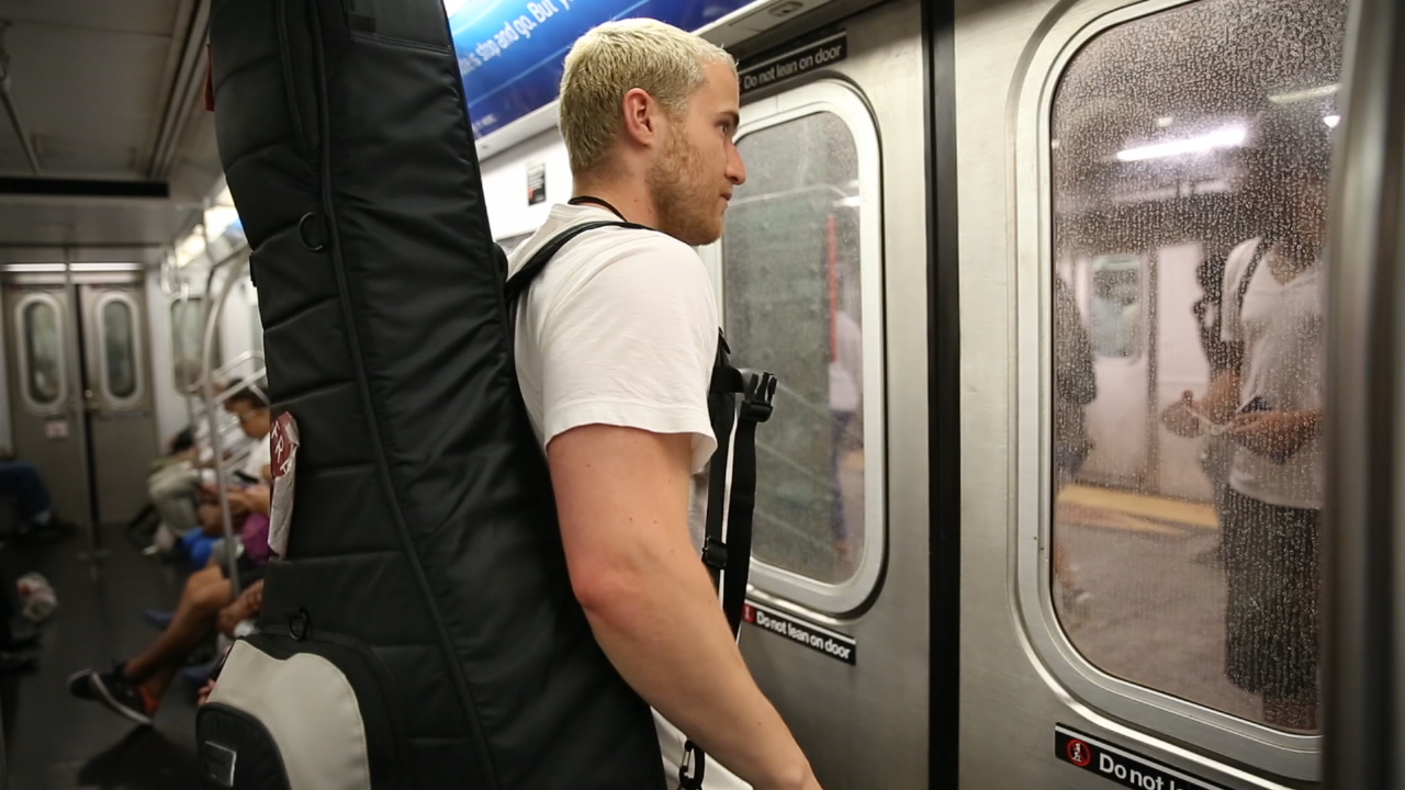 Mike Posner riding the subway to get to his show at the Barclays Center in Brooklyn, NY on July 8, 2016
