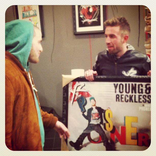 Chris "Drama" Pfaff presenting Mike Posner with a framed poster from Young & Reckless Spring 2012 campaign 2/2012
youngandreckless.com
