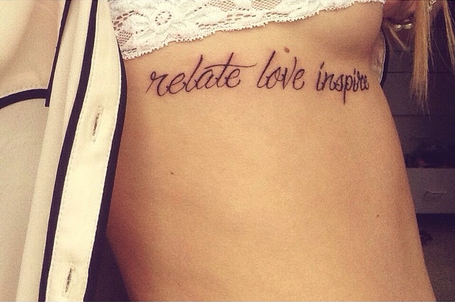 Emily's right side torso tattoo of Mike Posner's inspirational quote "Relate. Love. Inspire." December 2014
instagram.com/emilybrou_
