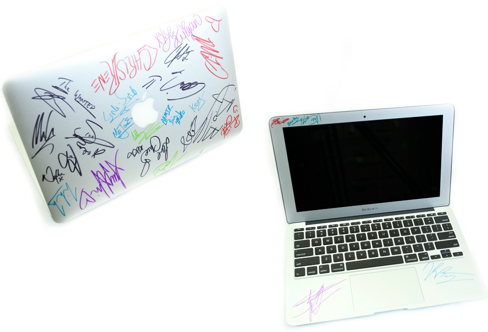 Mike Posner autographed MACBOOK - Auctioned off for "Aurora Victim Relief Fund"
