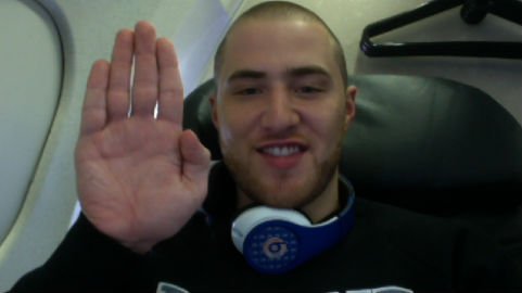 Mike Posner in a plane headed to Grand Rapids, MI 7/13/11
Mittens Up!
