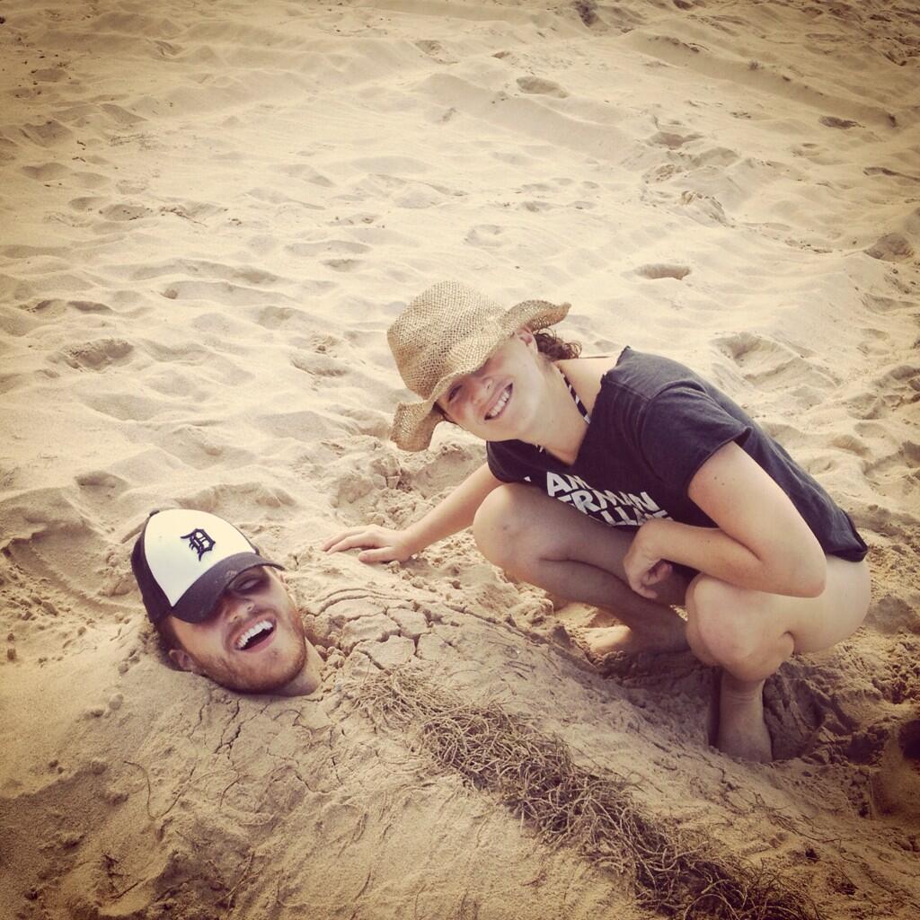 Mike Posner and big sister Emily Posner on a beach in Puerto Rico 10/27/13
