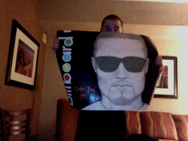 Mike Posner with Fanmade gift from NAU show 5/7/11
Mike Posner with Fanmade gift from NAU show 5/7/11