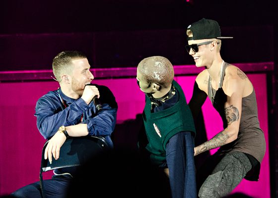 Justin Bieber pranks Mike Posner onstage during his performance on the Believe Tour in Indianapolis, IN 7/10/13
