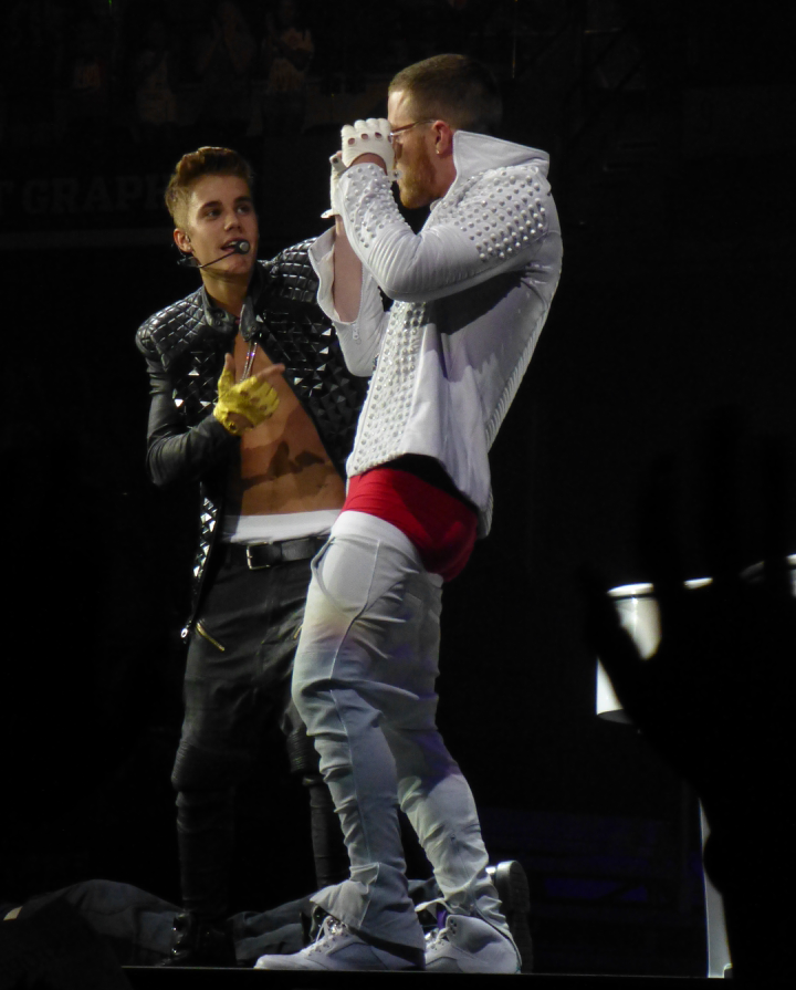 Mike Posner pranks Justin Bieber onstage during his performance on the Believe Tour in Indianapolis, IN 7/10/13
