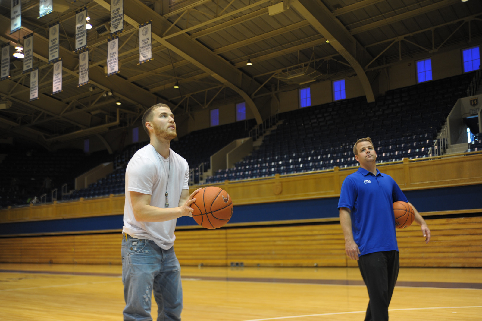 Mike Posner and Coach Steve "Wojo" Wojciechowski playing basketball at Cameron Indoor Stadium at Duke University 8/13/13
Photo by dukeblueplanet.com
