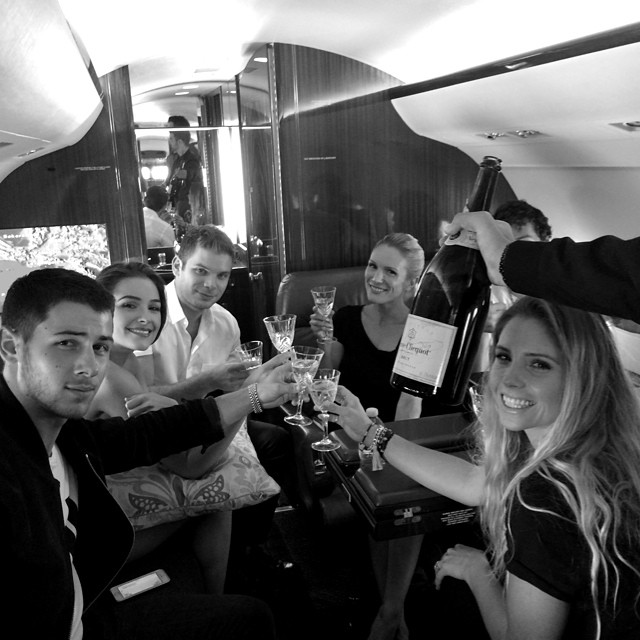 Mike Posner with Nick Jonas and Friends on a private jet headed to Vegas, NV 7/26/2014
You can't see Mike's face, only his hair. He's on the far right behind the bottle of champagne.
Instagram @nickjonas
 Mike Posner with Nick Jonas and Friends on a private jet headed to Vegas, NV 7/26/2014
You can't see Mike's face, only his hair. He's on the far right behind the bottle of champagne.
Instagram @nickjonas