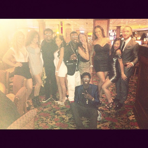 Mike Posner, Travis Porter and some models
